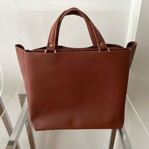 Brown faux leather handbag